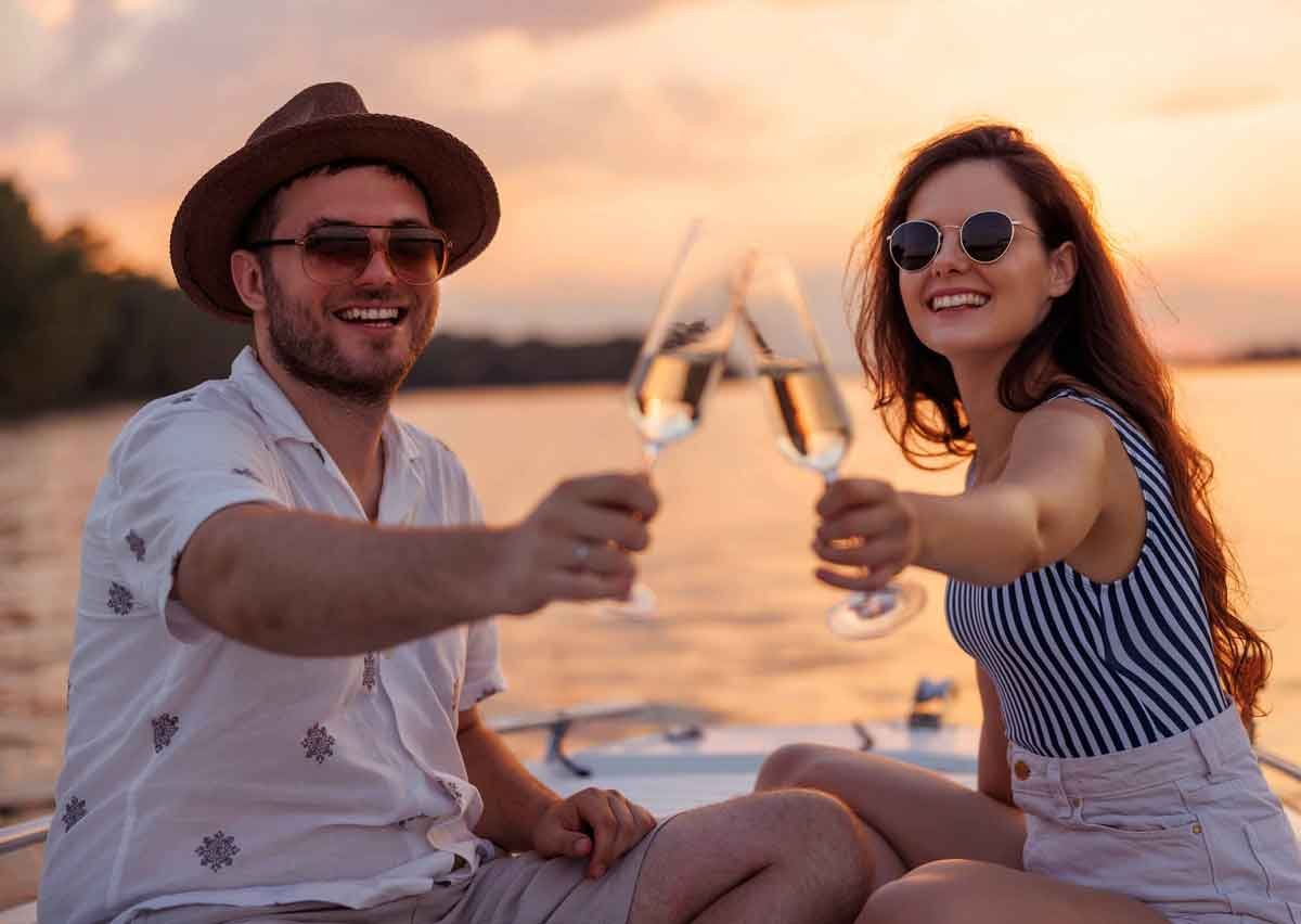 Couple having a drink during a private charter